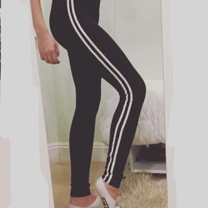 High waisted black joggers with 2 white strips